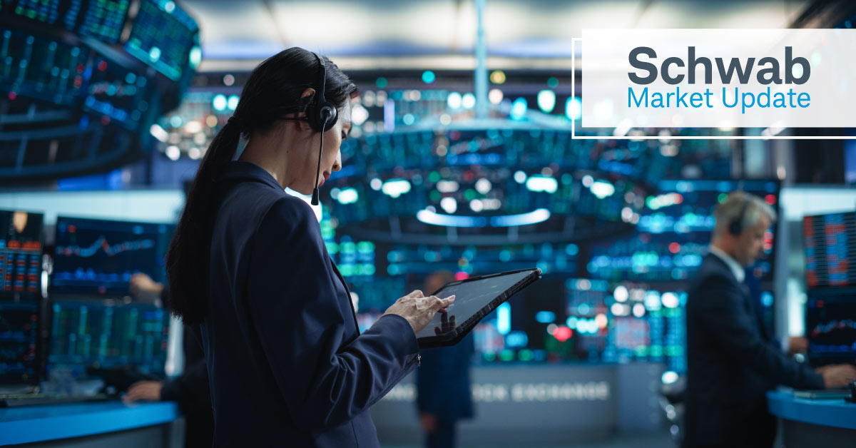 Schwab Market Update: A view of traders on a stock exchange trading floor. 